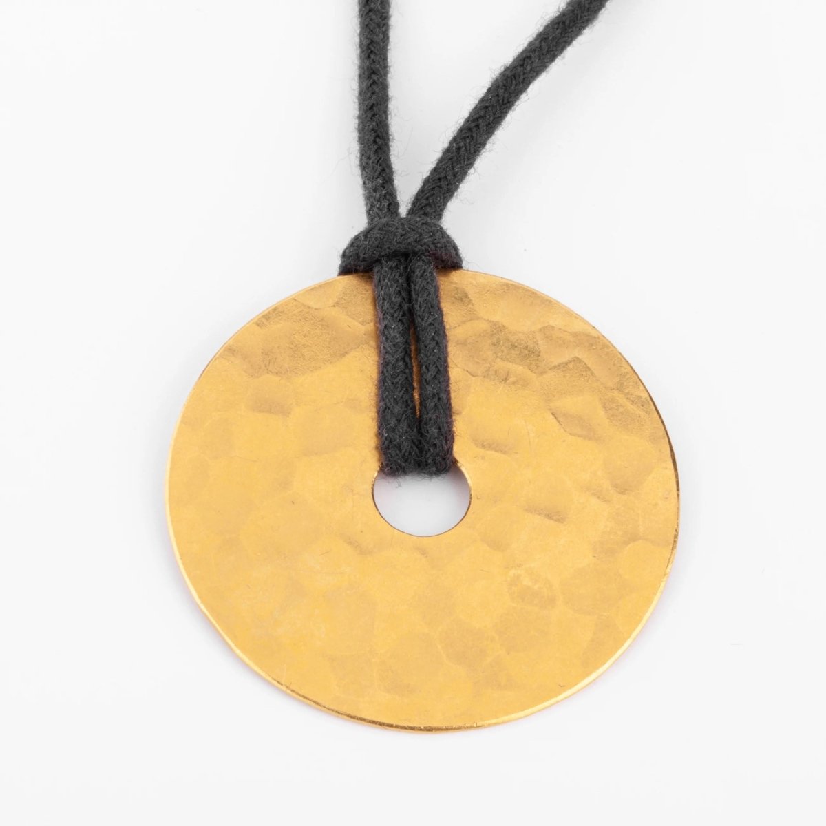 Pendentif martelée de la maison Dinh Van modèle cible - Castafiore