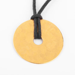 Pendentif martelée de la maison Dinh Van modèle cible - Castafiore