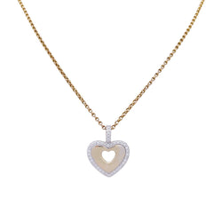 Pendentif Poiray, "Coeur secret", or jaune, or blanc et diamants. - Castafiore