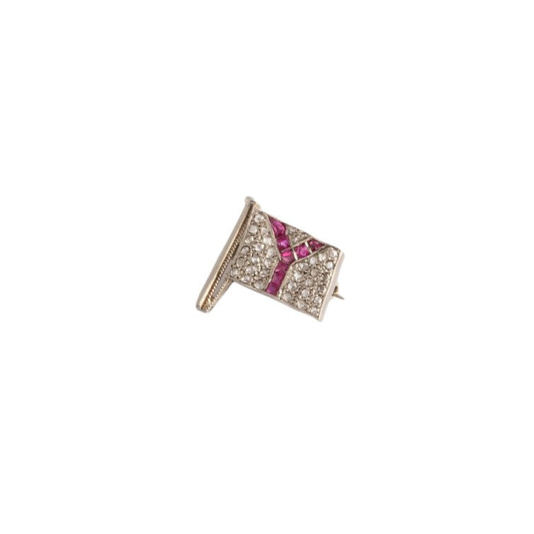 Petite broche en or blanc, diamants et rubis - Castafiore