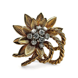 REGNER Broche - clip fleur en or et platine serti de diamants. - Castafiore