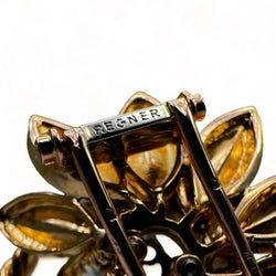 REGNER Broche - clip fleur en or et platine serti de diamants. - Castafiore