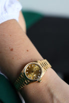 Rolex Montre Oyster Perpetual Date Juste Or jaune Diamant - Castafiore