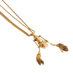 Sautoir en or jaune retenant deux pompons - Castafiore