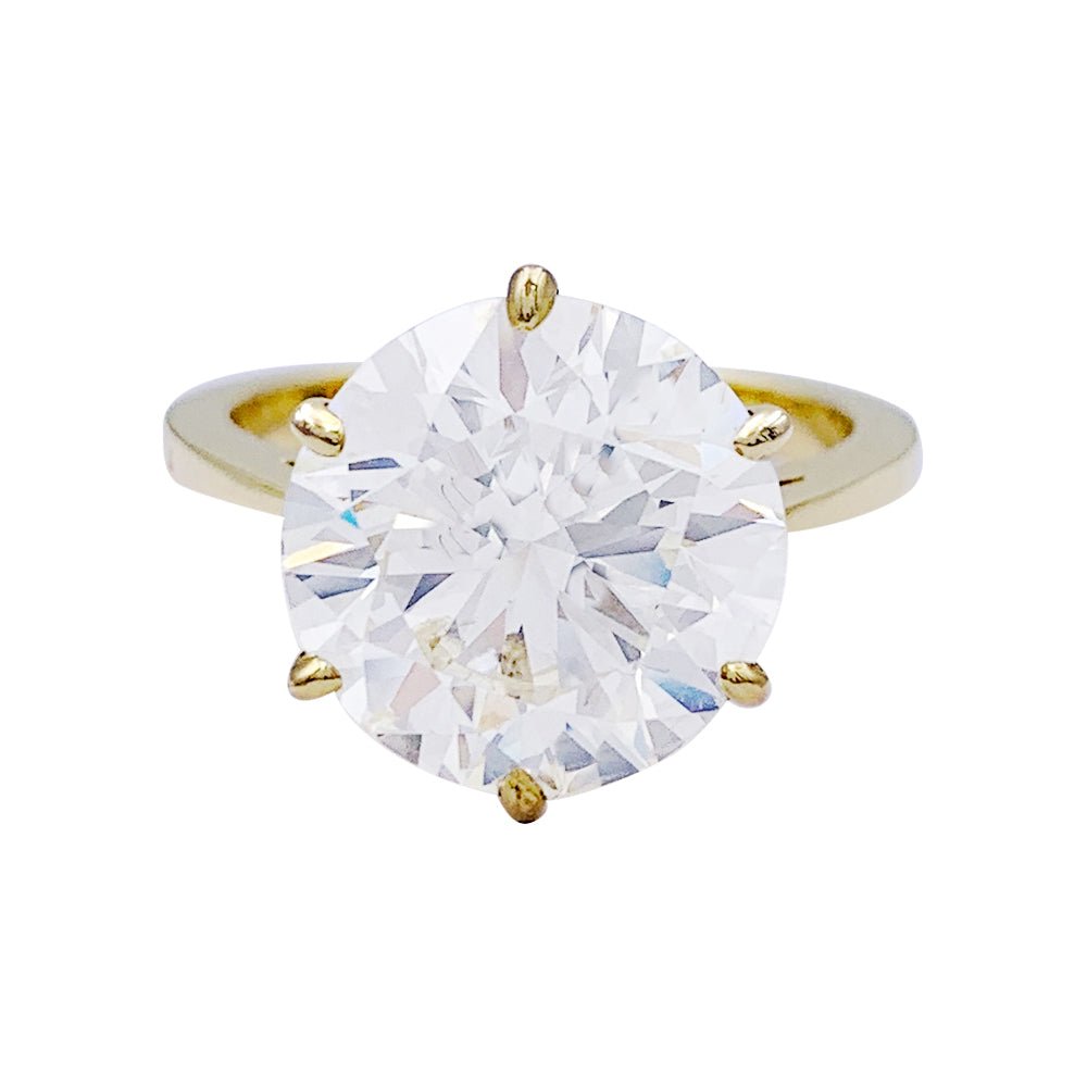 Solitaire en or jaune, diamant 5,77 cts. - Castafiore